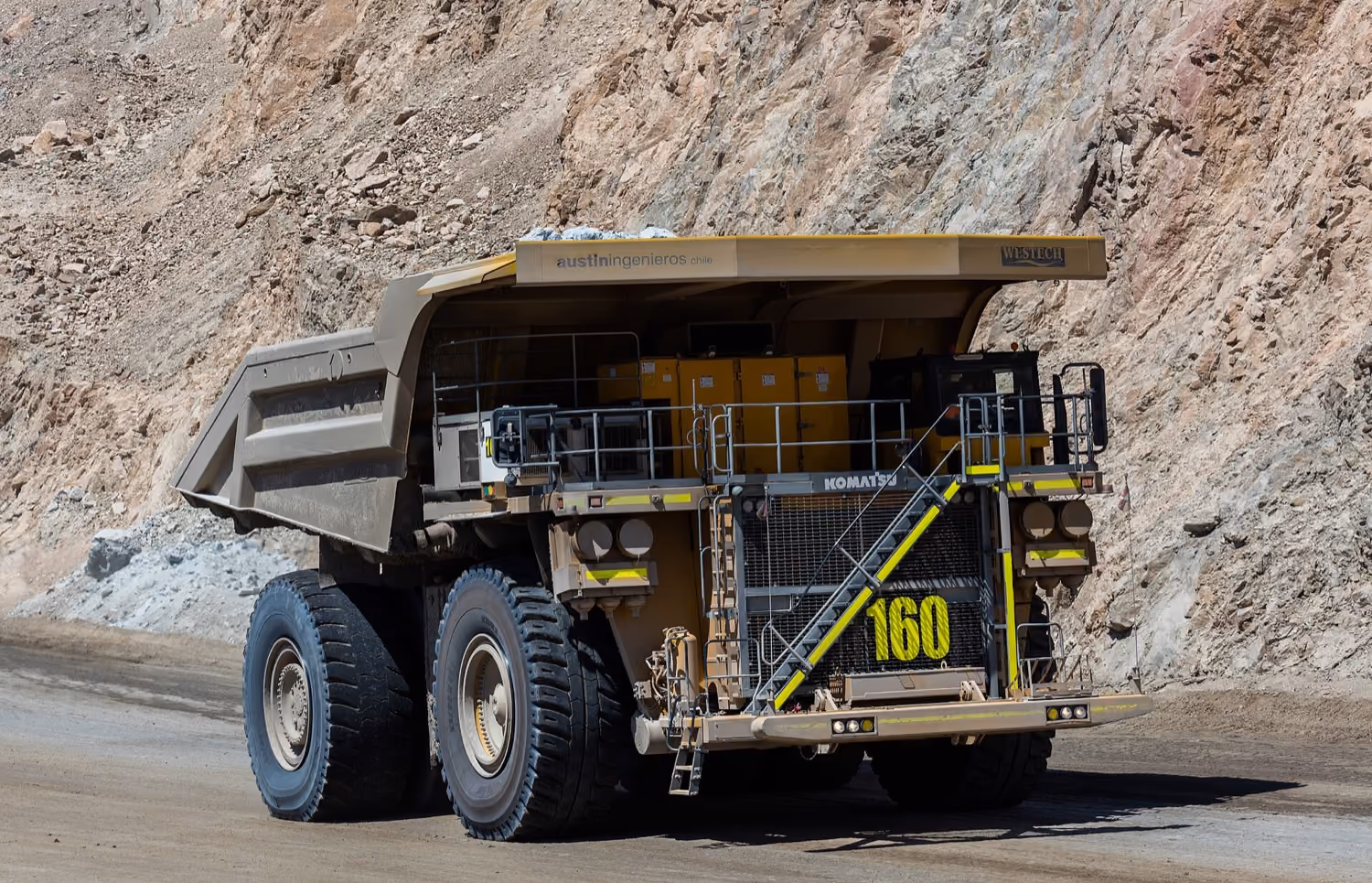 Haul truck loading ore at an open pit mine